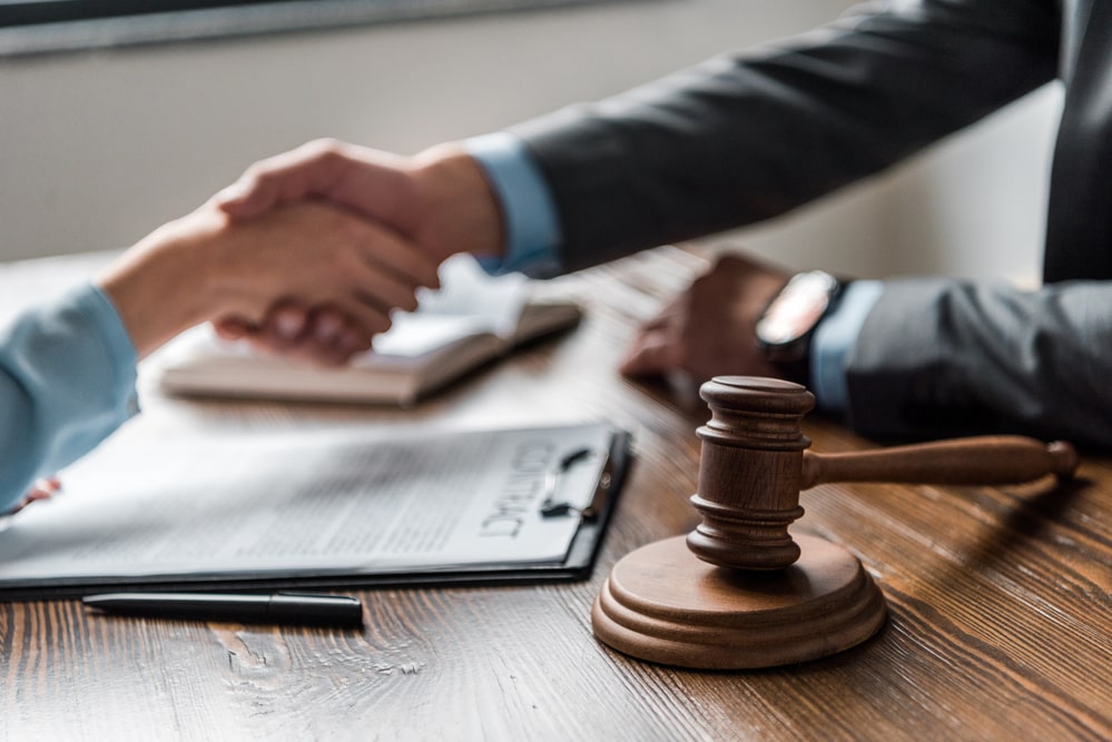 New Braunfels small business lawyer reviewing documents